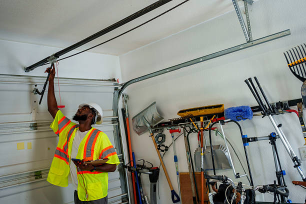 Professional Garage Door Installation technician working in Watford City, ND